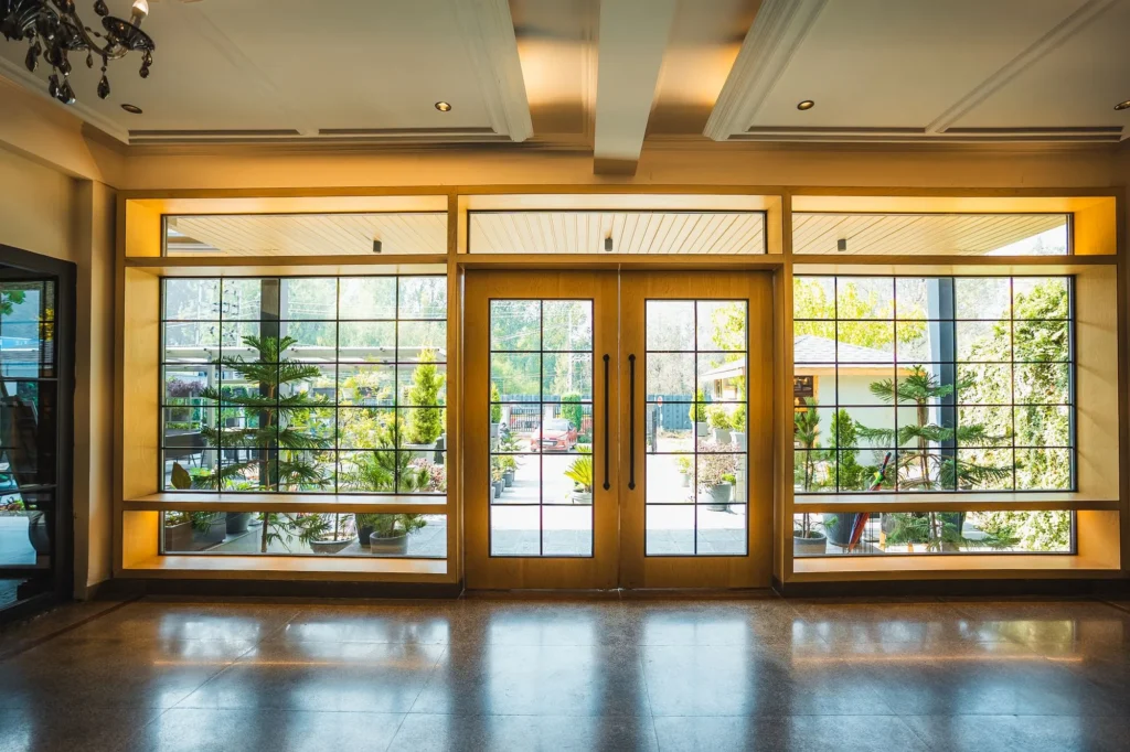Entrance hall with glass doors and a view of the garden