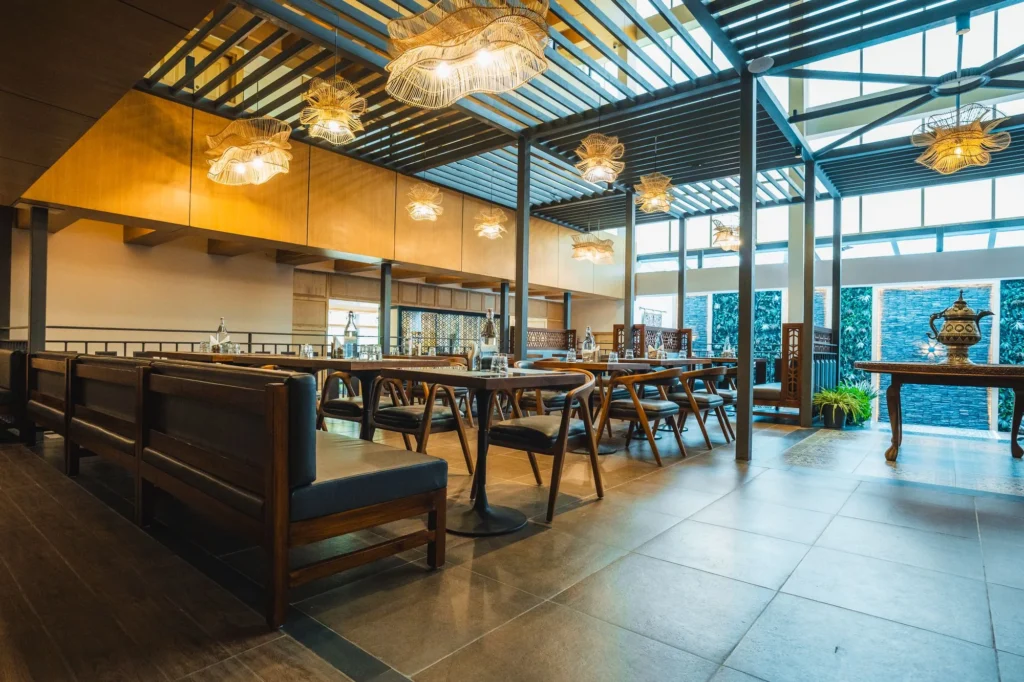 Nayaab Restaurant & Lounge with lounge seating and hanging lights
