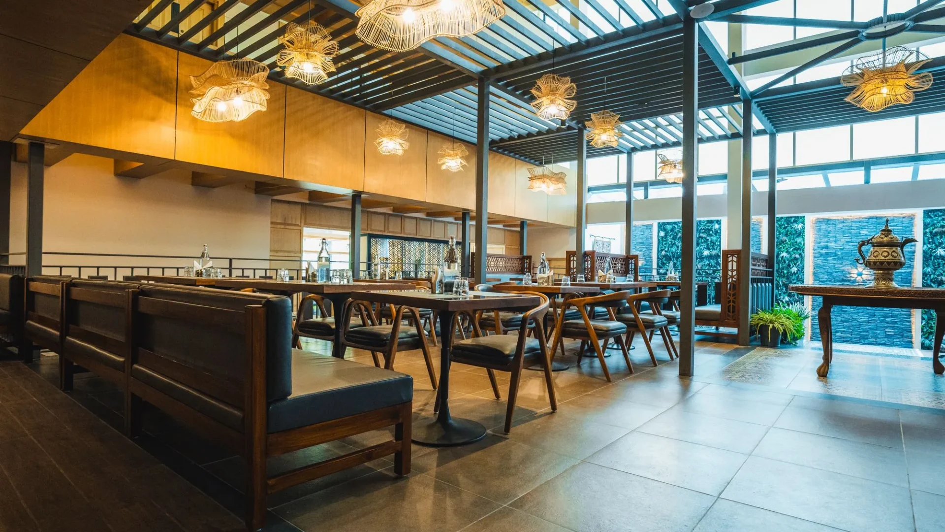 Nayaab Restaurant & Lounge with lounge seating and hanging lights