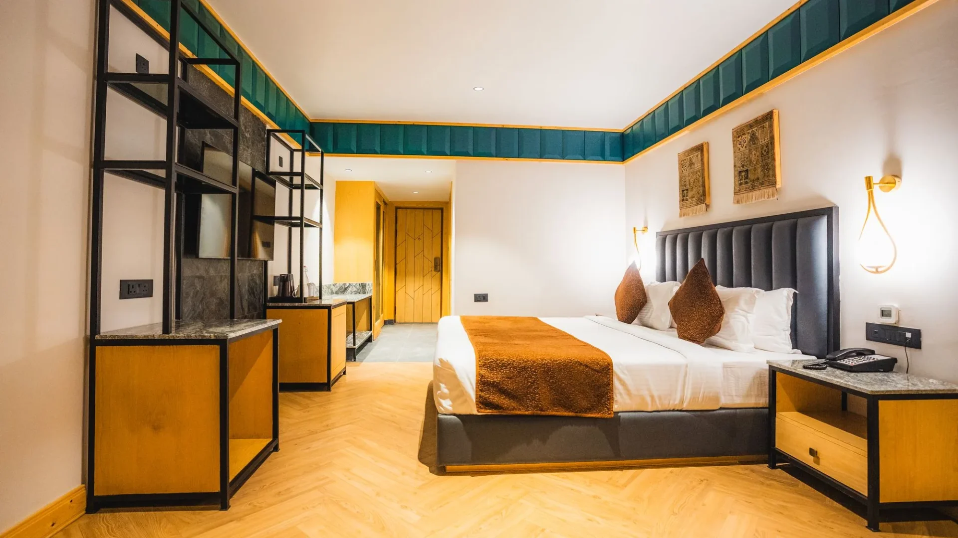 Premium Room with king bed, television unit and wooden floor