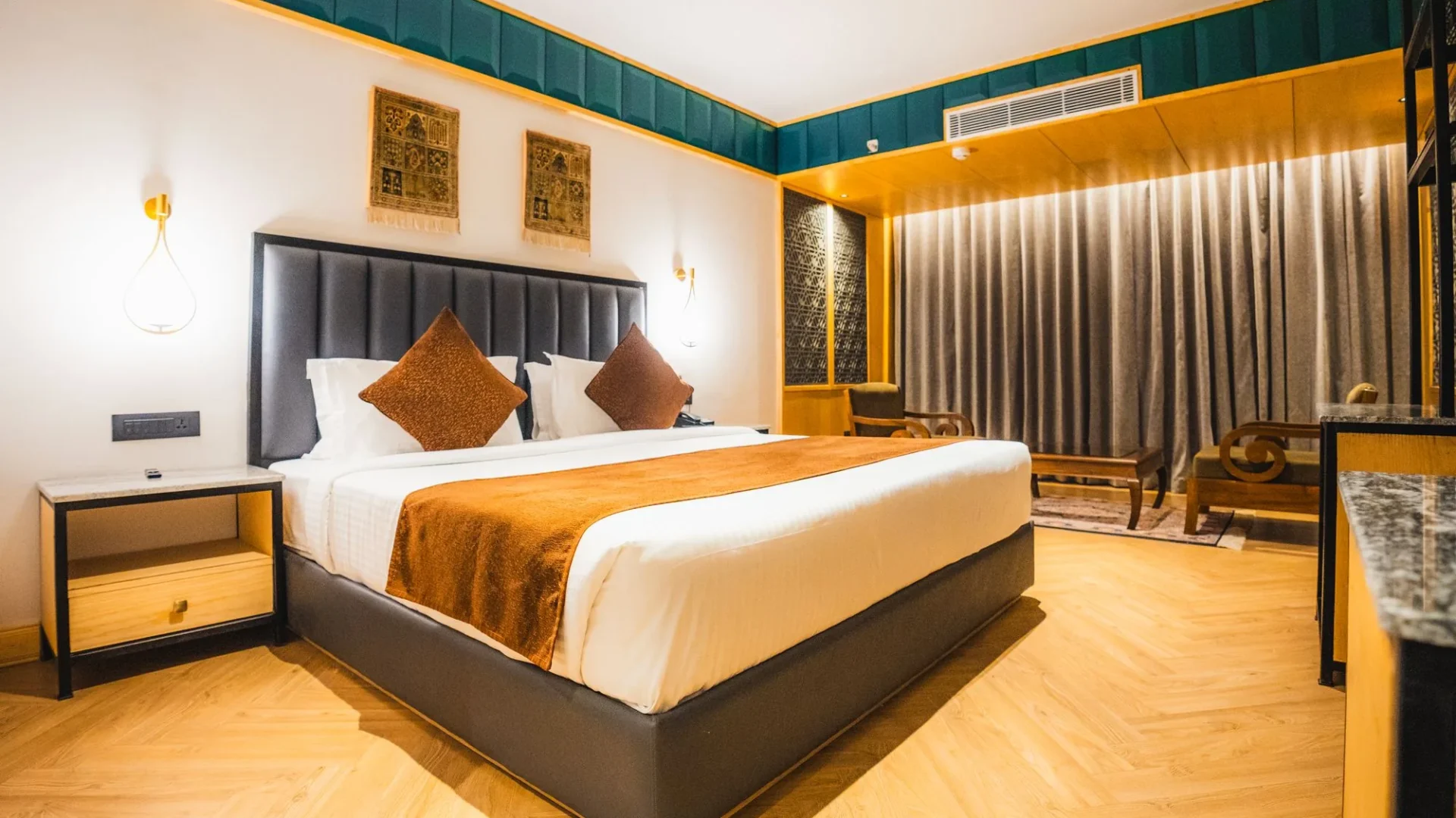 Premium Room with king bed and curtained seating area